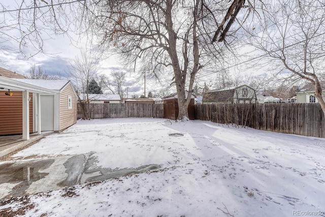 view of yard covered in snow