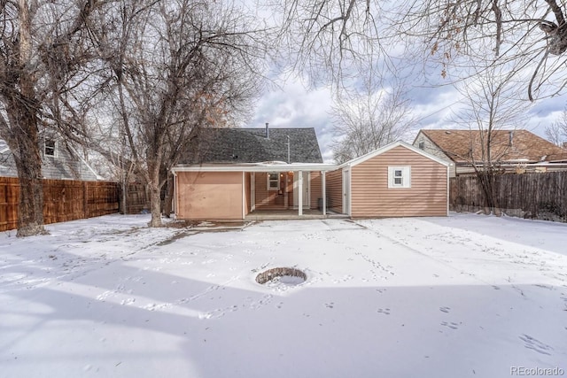 view of snow covered property