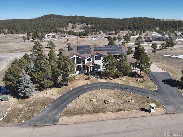 bird's eye view with a forest view