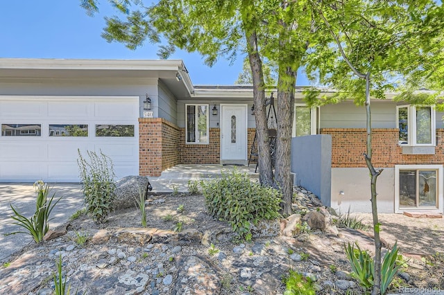 540 Ithaca Dr, Boulder, CO 80305 - single story home featuring brick siding and an attached garage