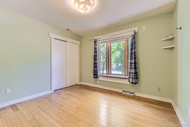 540 Ithaca Dr, Boulder, CO 80305 - unfurnished bedroom with wood finished floors and a closet