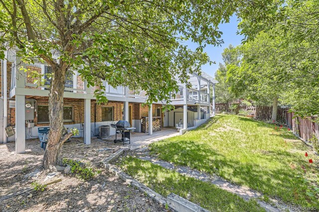 540 Ithaca Dr, Boulder, CO 80305 - fenced backyard with a patio area and a wooden deck