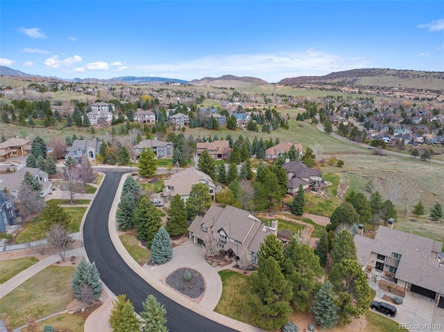 aerial view with a mountain view and a residential view