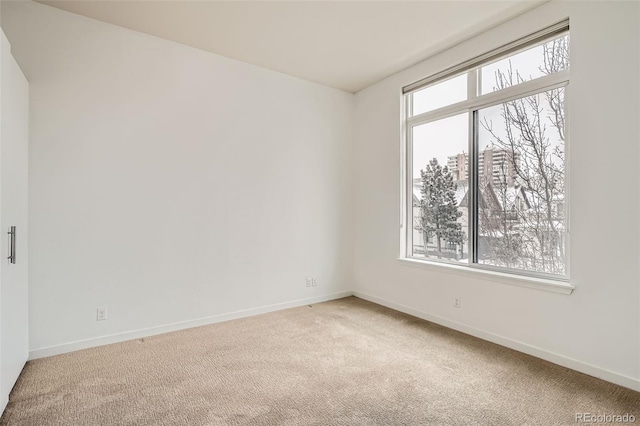 336 E 1st Ave Unit 200, Denver, CO 80203 - unfurnished room featuring light colored carpet