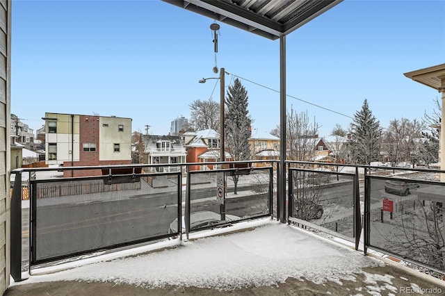 336 E 1st Ave Unit 200, Denver, CO 80203 - snow covered back of property featuring a residential view
