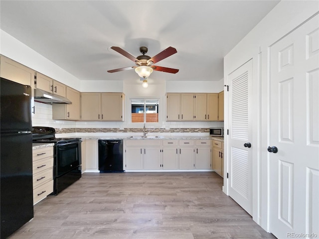 kitchen with sink, ceiling fan, decorative backsplash, and black appliances