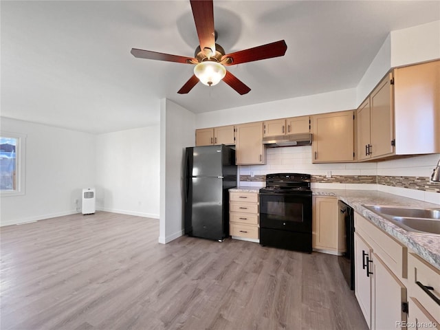 kitchen featuring light hardwood / wood-style floors, ceiling fan, decorative backsplash, black appliances, and sink