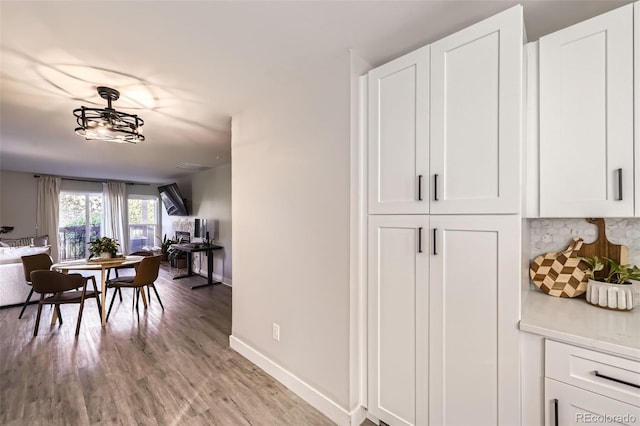 8450 Decatur St Unit 97, Westminster, CO 80031 - dining area with light wood finished floors and baseboards