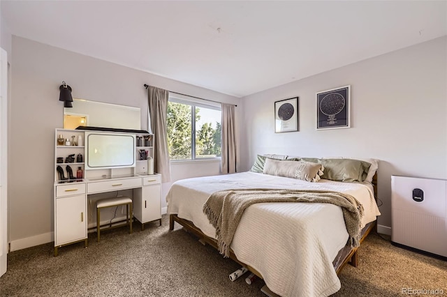 8450 Decatur St Unit 97, Westminster, CO 80031 - bedroom featuring carpet and baseboards