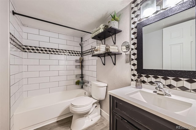 8450 Decatur St Unit 97, Westminster, CO 80031 - bathroom with wood finished floors, vanity, shower / bathtub combination, and a textured wall