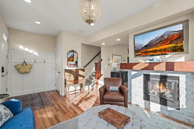 2801 W 23rd Ave, Denver, CO 80211 - living area featuring a notable chandelier, stairway, recessed lighting, and wood finished floors