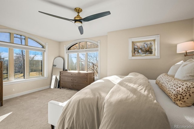 2801 W 23rd Ave, Denver, CO 80211 - bedroom with light colored carpet, baseboards, and ceiling fan