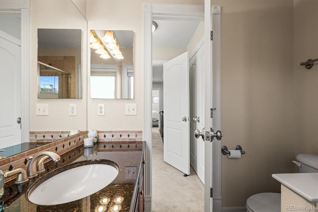 2801 W 23rd Ave, Denver, CO 80211 - bathroom featuring toilet, a shower, a chandelier, tasteful backsplash, and vanity