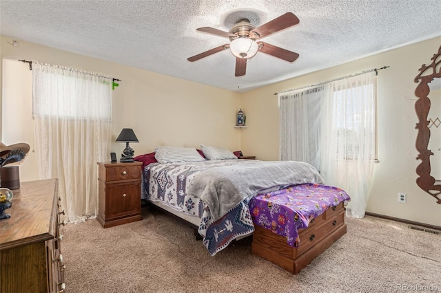 9400 W Burgundy Ave, Littleton, CO 80123 - bedroom with carpet floors, a textured ceiling, and a ceiling fan