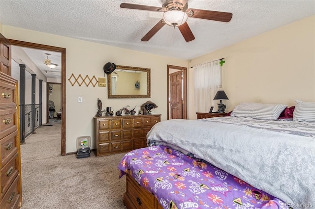 9400 W Burgundy Ave, Littleton, CO 80123 - bedroom with light carpet, a textured ceiling, and ceiling fan