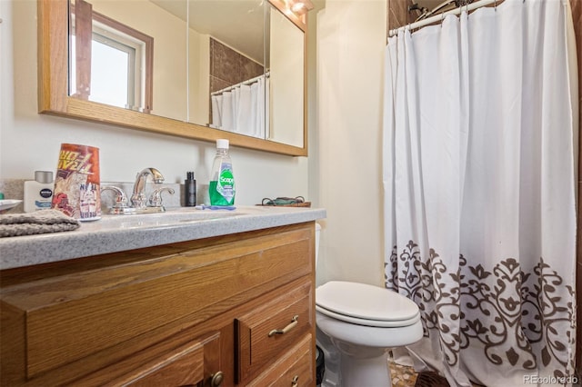 9400 W Burgundy Ave, Littleton, CO 80123 - bathroom featuring vanity and a shower with shower curtain