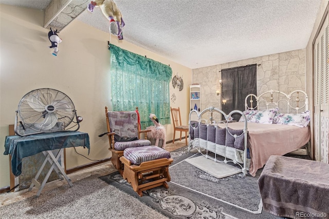 9400 W Burgundy Ave, Littleton, CO 80123 - bedroom featuring a textured ceiling