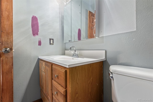 9400 W Burgundy Ave, Littleton, CO 80123 - bathroom featuring vanity and toilet