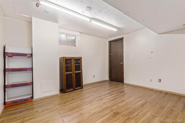 9400 W Burgundy Ave, Littleton, CO 80123 - spare room with wood finished floors and baseboards