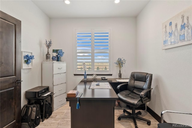 office space with recessed lighting and light wood finished floors