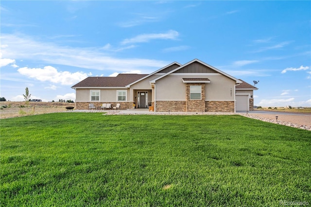 ranch-style house featuring a garage, a front lawn, and stucco siding