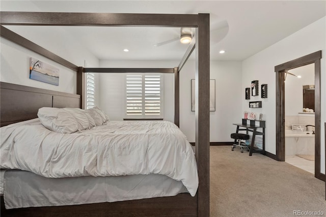 bedroom with ensuite bath, recessed lighting, carpet flooring, and baseboards