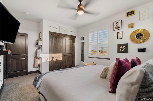 bedroom with carpet flooring, a ceiling fan, and baseboards