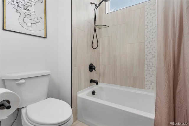 bathroom with shower / bathtub combination with curtain and toilet