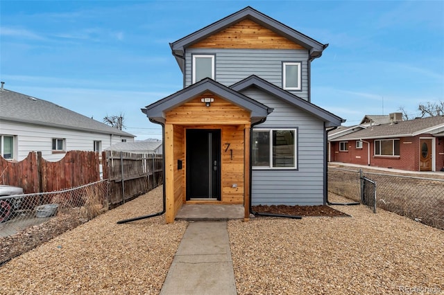 view of front facade with a fenced backyard