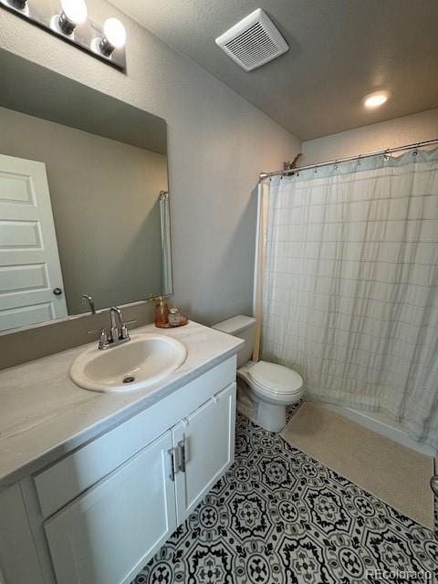 1353 Reynolds St Unit 5A, Fort Lupton, CO 80621 - full bath with vanity, toilet, and a shower with curtain