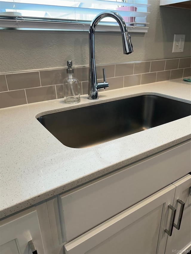 1353 Reynolds St Unit 5A, Fort Lupton, CO 80621 - kitchen view of backsplash and light stone counters