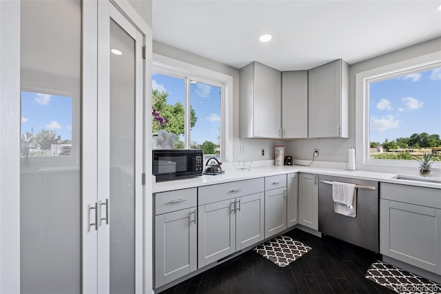 15528 Nancy Ave, Fort Lupton, CO 80621 - kitchen with dishwasher, gray cabinetry, black microwave, plenty of natural light, and recessed lighting