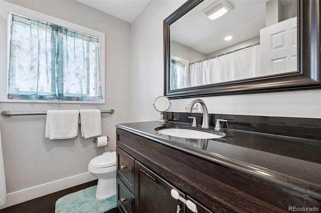 15528 Nancy Ave, Fort Lupton, CO 80621 - bathroom with vanity and wood finished floors