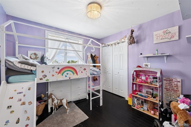 15528 Nancy Ave, Fort Lupton, CO 80621 - bedroom featuring a closet and wood finished floors