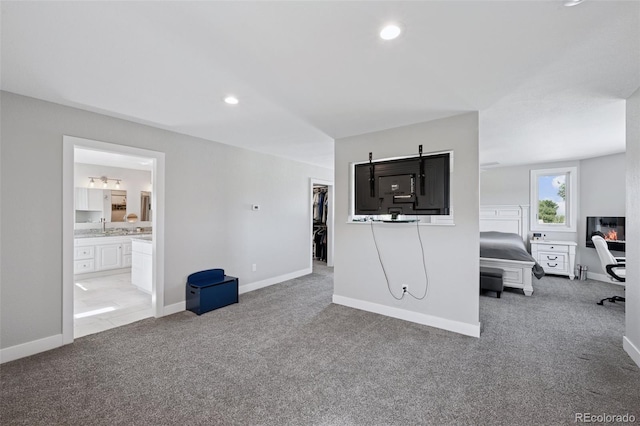 15528 Nancy Ave, Fort Lupton, CO 80621 - living area with light carpet and recessed lighting