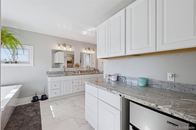 15528 Nancy Ave, Fort Lupton, CO 80621 - full bathroom featuring vanity, a bath, and marble finish flooring
