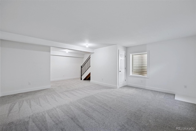 15528 Nancy Ave, Fort Lupton, CO 80621 - below grade area featuring stairs and carpet floors