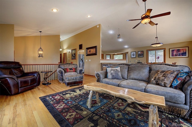 199 Elk Horn Ct, Bailey, CO 80421 - living area featuring lofted ceiling, wood finished floors, and ceiling fan