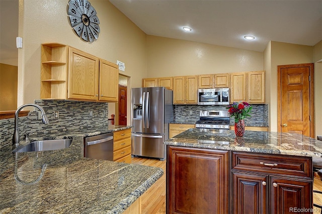 199 Elk Horn Ct, Bailey, CO 80421 - kitchen featuring appliances with stainless steel finishes, a sink, open shelves, backsplash, and light wood finished floors