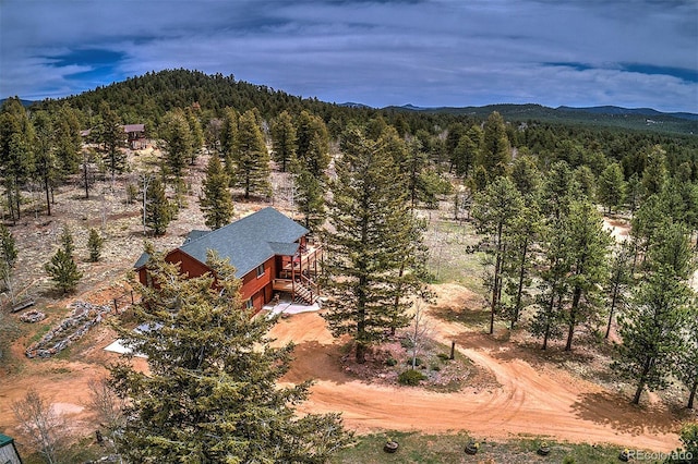 199 Elk Horn Ct, Bailey, CO 80421 - aerial view of property and surrounding area with a forest and a mountain backdrop