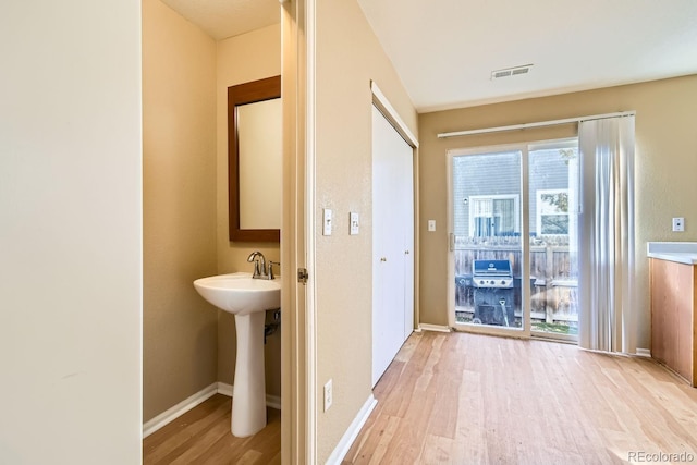 bathroom featuring hardwood / wood-style floors