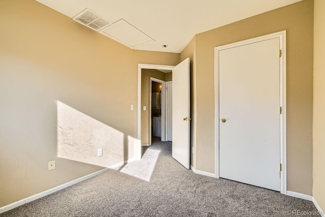 unfurnished bedroom featuring carpet