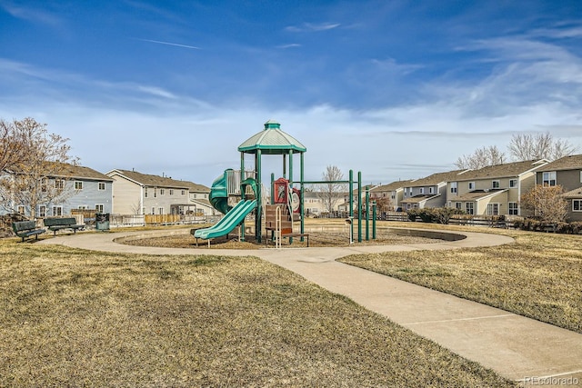 view of playground featuring a lawn