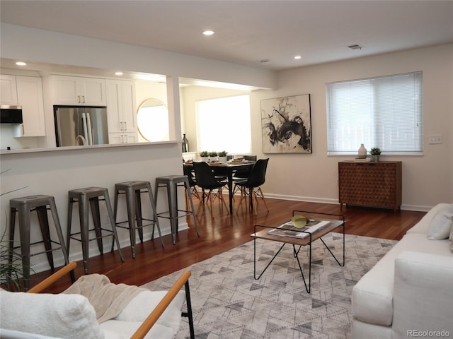 7700 W Glasgow Pl Unit 1A, Littleton, CO 80128 - living area featuring wood finished floors and recessed lighting