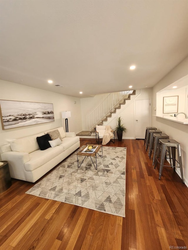 7700 W Glasgow Pl Unit 1A, Littleton, CO 80128 - living area with stairway, wood finished floors, and recessed lighting