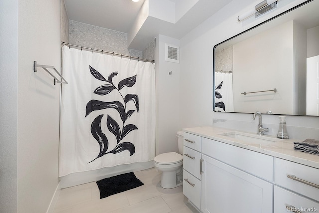 bathroom featuring vanity, toilet, curtained shower, and tile patterned flooring