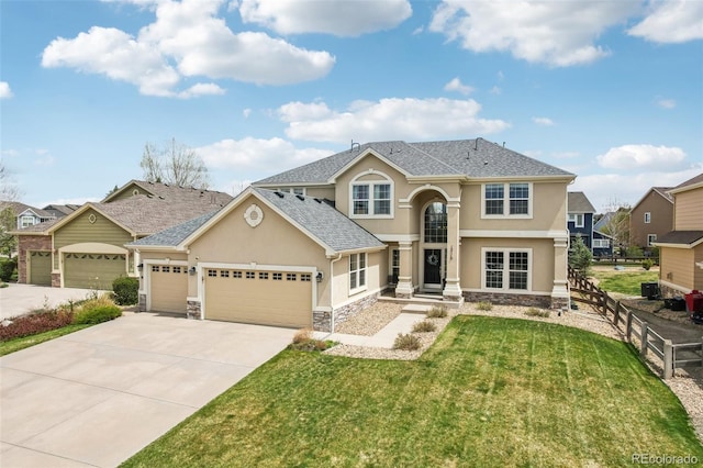 view of front facade featuring stucco siding, stone siding, a garage, and driveway