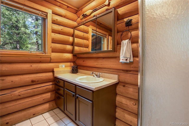 2255 Spruce Rd, Woodland Park, CO 80863 - bathroom featuring vanity, log walls, and tile patterned flooring