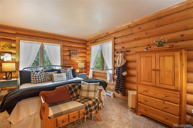 2255 Spruce Rd, Woodland Park, CO 80863 - bedroom with carpet floors, a baseboard heating unit, and log walls