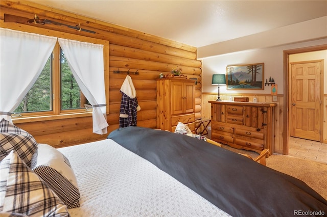2255 Spruce Rd, Woodland Park, CO 80863 - bedroom featuring log walls